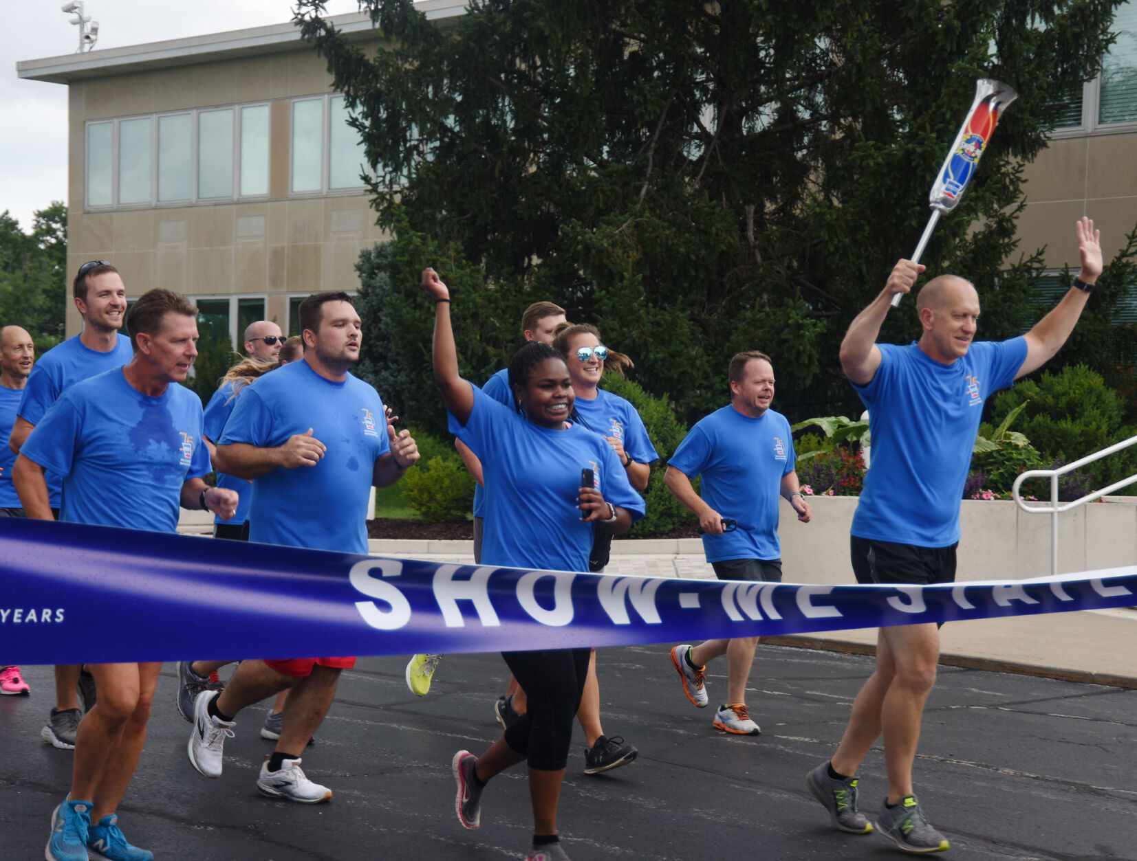 Show-Me State Games athletes run through the finish line